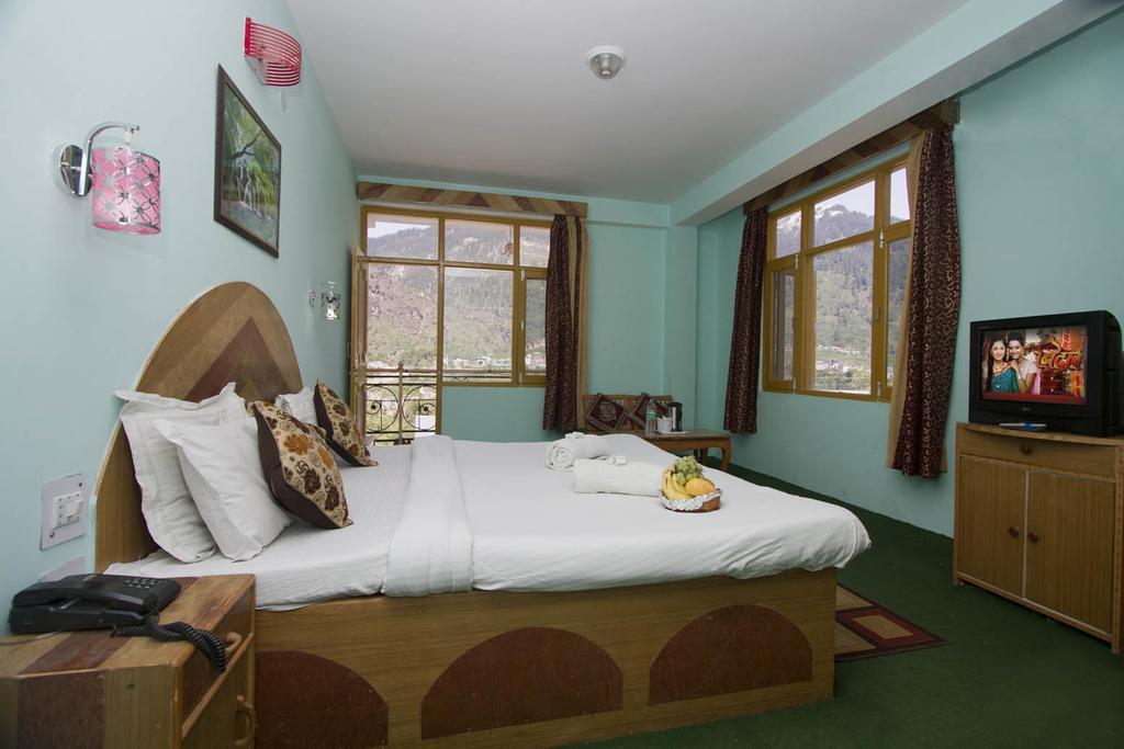 Hotel Ocean Inn Manāli Szoba fotó